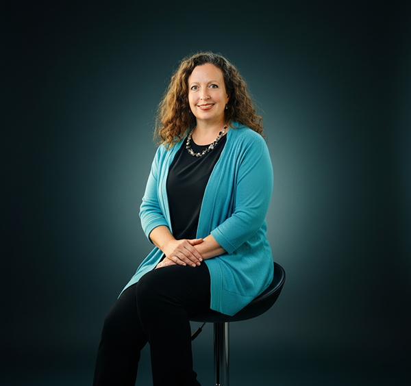 About Emily Tell, EMBA